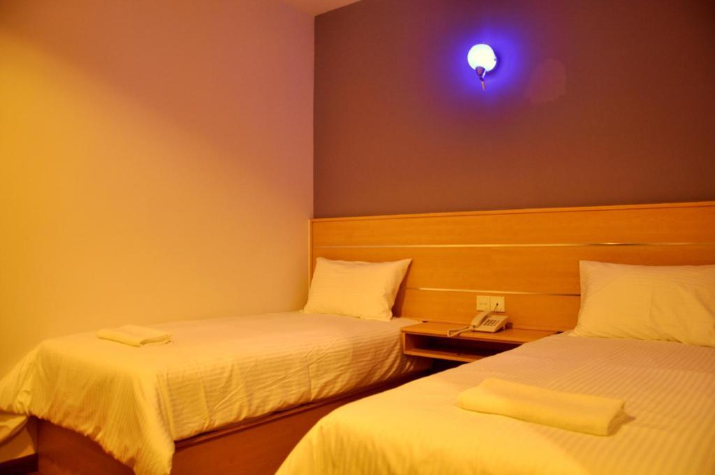 Hotel Economy Kapar Cameră foto